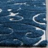 2'3"x4' Swirl Loomed Accent Rug Dark Blue/Cream - Safavieh